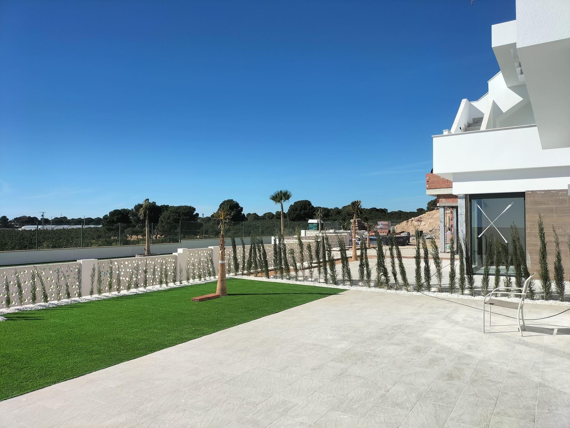 Evening exterior view of new-build villa, Pinar de Campoverde