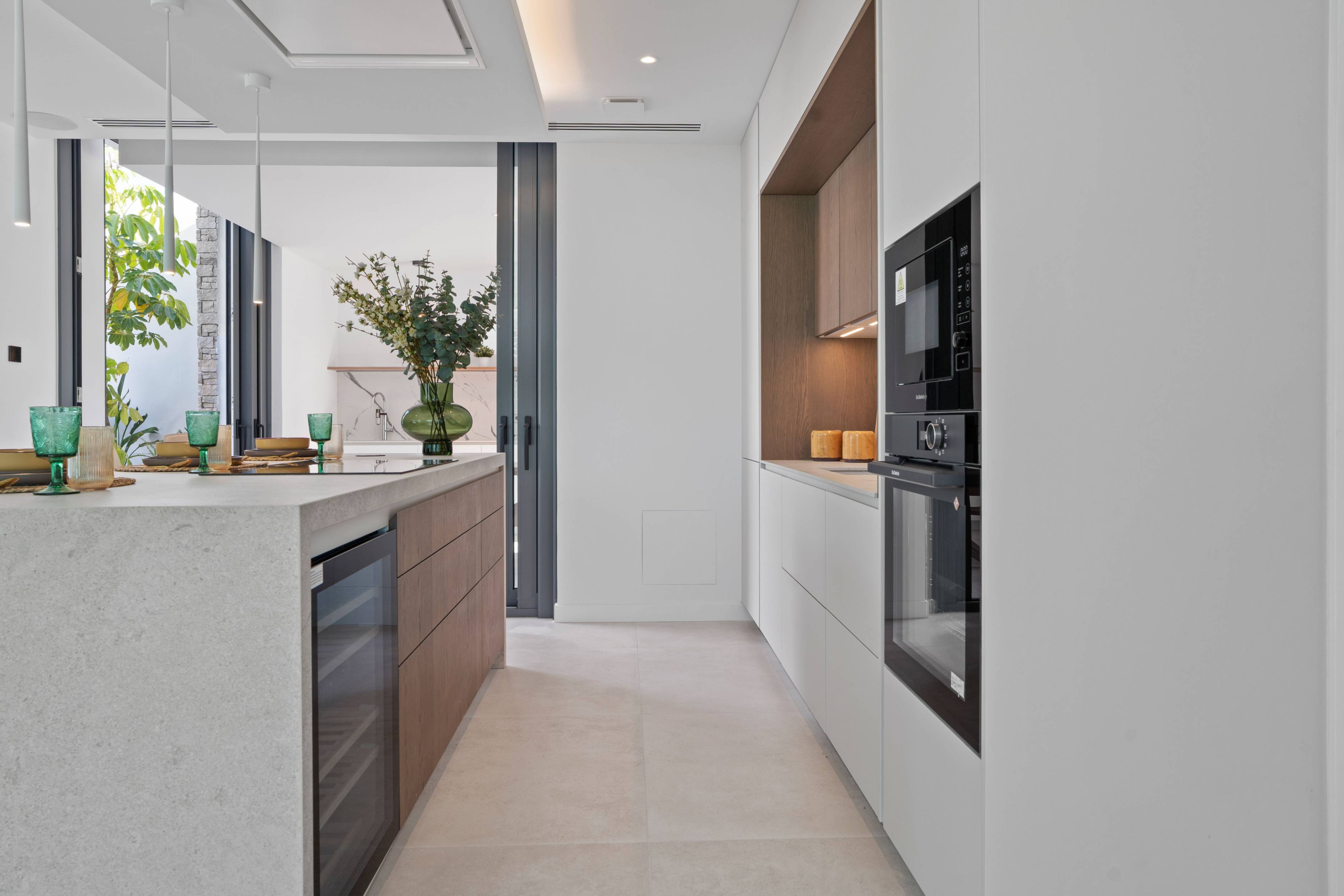 Dining area adjacent to kitchen in new-build villa, Rincón de Loix