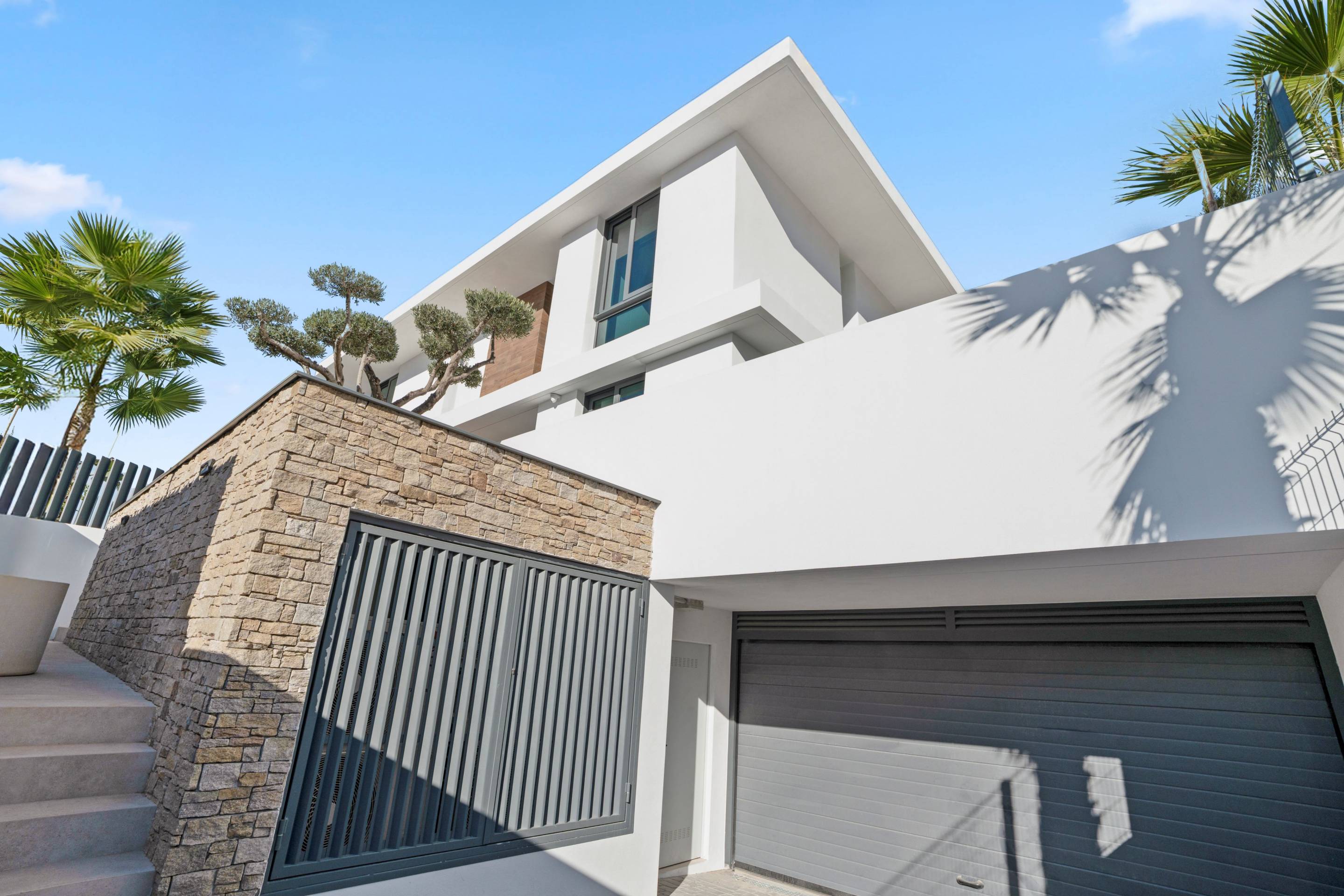 Rear exterior of new-build villa showing pool area, Rincón de Loix, Benidorm
