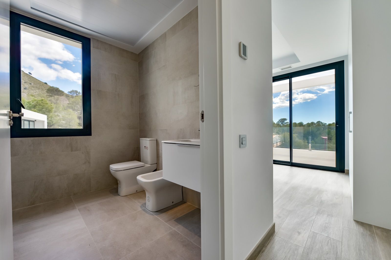 Living room with terrace doors open, Golf Bahía villa, Finestrat